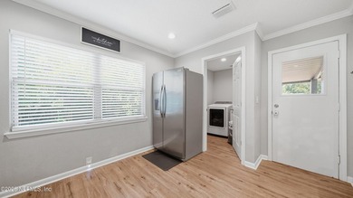 Welcome to this beautifully renovated 4-bedroom, 3-bathroom - photo 13
