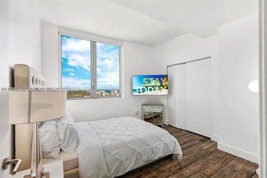 PENTHOUSE UNIT -  & SHORT TERM RENTAL FRIENDLY! Situated in the - photo 19