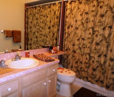 This charming residence, boasting three bedrooms and two - photo 21