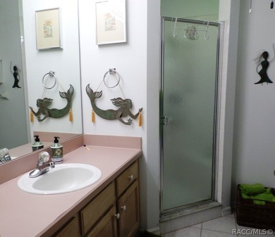 This charming residence, boasting three bedrooms and two - photo 25
