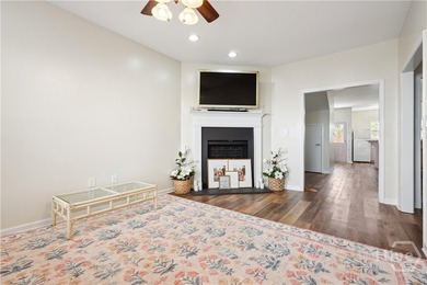ASSUMABLE LOAN! Move-in ready and packed with updates! This - photo 3