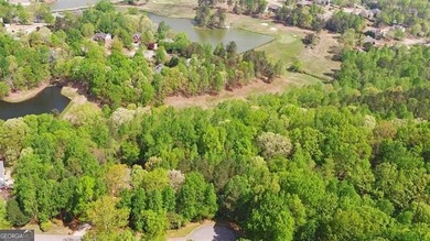 This 1.56 acre, CUL DE SAC GOLF COURSE LOT is located in the - photo 3