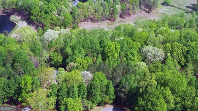 This 1.56 acre, CUL DE SAC GOLF COURSE LOT is located in the - photo 4