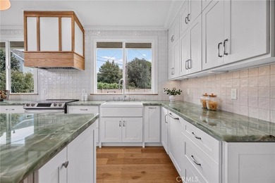 Exceptional custom-remodeled residence tucked away at the end of - photo 7