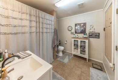 Well-maintained two-bedroom, two-bathroom home situated on two