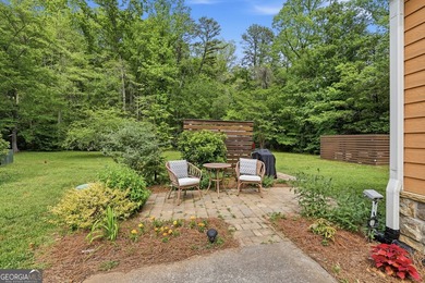 Nestled along a peaceful creek in the gated Sugar Mill Creek at - photo 4