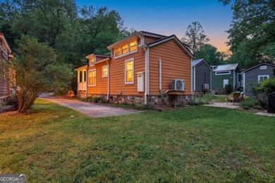 Nestled along a peaceful creek in the gated Sugar Mill Creek at - photo 5