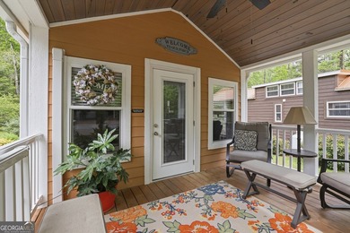 Nestled along a peaceful creek in the gated Sugar Mill Creek at - photo 7