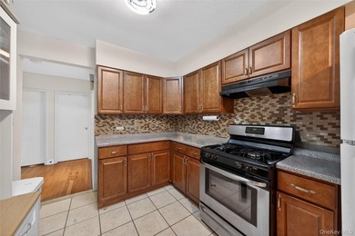 Well-maintained 3-story, 2-family brick home featuring a - photo 7