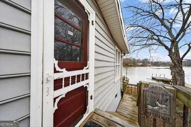 DEEDED LAKEFRONT RETREAT Welcome to an elevated lakeside - photo 3