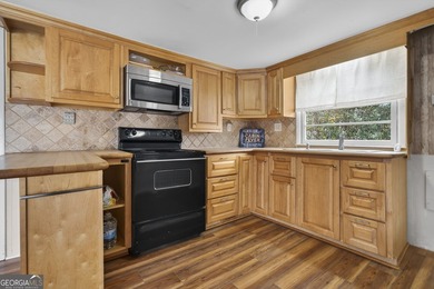 DEEDED LAKEFRONT RETREAT Welcome to an elevated lakeside - photo 7