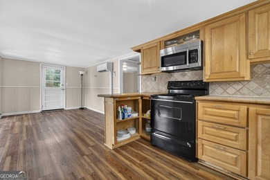 DEEDED LAKEFRONT RETREAT Welcome to an elevated lakeside - photo 8