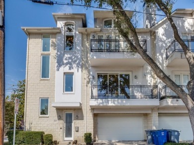 No HOA for this elegant corner townhome with tall ceilings and