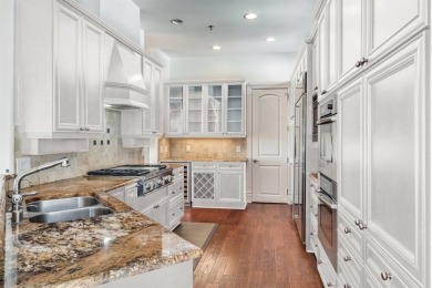 No HOA for this elegant corner townhome with tall ceilings and