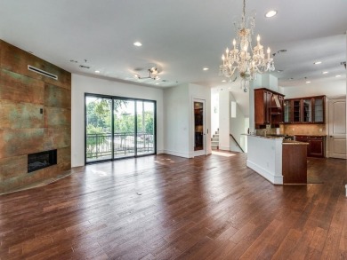 No HOA for this elegant corner townhome with tall ceilings and