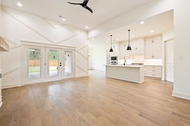 Welcome home to this stunning new construction white painted - photo 11