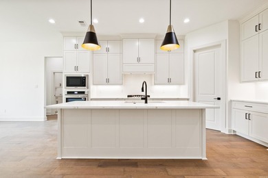 Welcome home to this stunning new construction white painted - photo 13