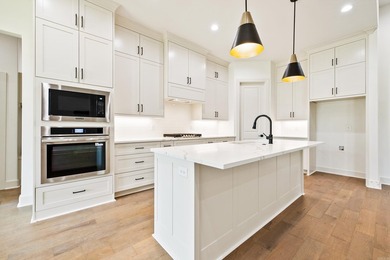Welcome home to this stunning new construction white painted - photo 14