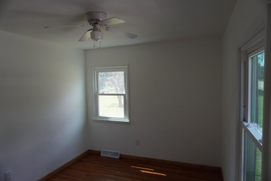 This very livable home in Newell SD has the original wood floors