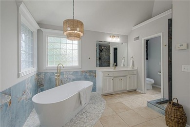 This elegantly crafted 5 bedroom, 4.5 bath home offers refined - photo 24