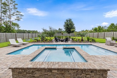 Welcome to this stunning home with a gorgeous heated pool in The - photo 30