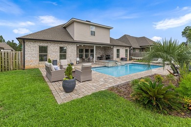 Welcome to this stunning home with a gorgeous heated pool in The - photo 34