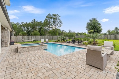 Welcome to this stunning home with a gorgeous heated pool in The - photo 35