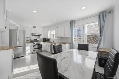 Sun filled, fully brick above ground 3 story townhouse with open - photo 6