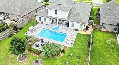 Welcome to this stunning home with a gorgeous heated pool in The - photo 37