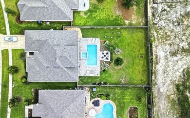 Welcome to this stunning home with a gorgeous heated pool in The - photo 38