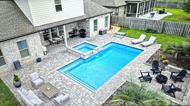 Welcome to this stunning home with a gorgeous heated pool in The - photo 39