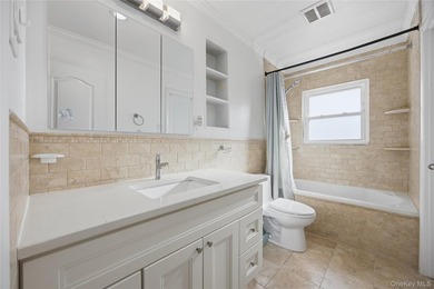Sun filled, fully brick above ground 3 story townhouse with open - photo 10