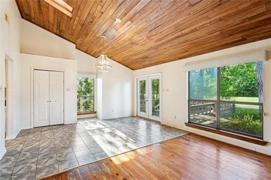 Priced to sell & nestled within the gates of Beau Chene, this - photo 4