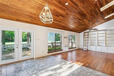 Priced to sell & nestled within the gates of Beau Chene, this - photo 5