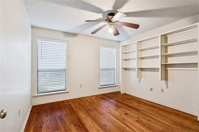 Priced to sell & nestled within the gates of Beau Chene, this - photo 8