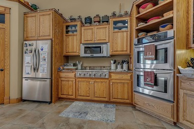 Experience an unparalleled lifestyle in this masterfully crafted - photo 11