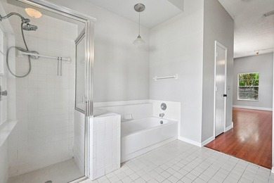 Tucked away in a private setting, this charming 3-bedroom - photo 15