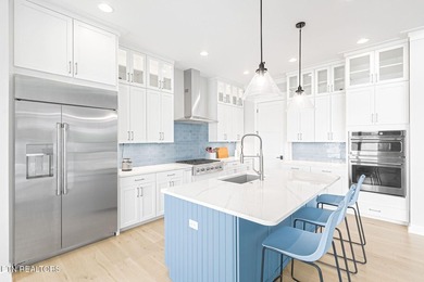 Experience waterfront luxury at its finest in this stunning - photo 17