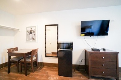 COMPLETELY REMODELED 16 UNIT MOTEL LOCATED IN SIGNAL HILL - photo 21