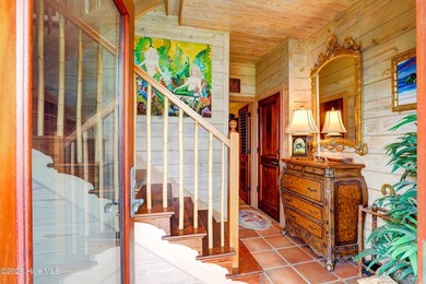 A truly unique oceanfront opportunity in Topsail Beach, this