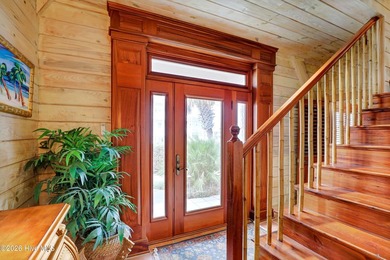 A truly unique oceanfront opportunity in Topsail Beach, this