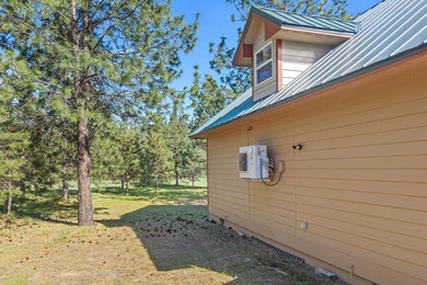 Perched above Lake Roosevelt on 10 private acres, this charming - photo 44