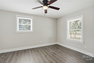 Beautifully renovated and move-in ready, this 4 bedroom, 3 - photo 4
