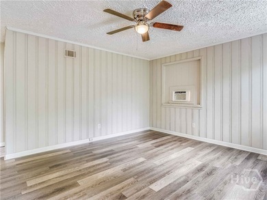 Solid and low-maintenance, this all-brick triplex sits in Garden - photo 3