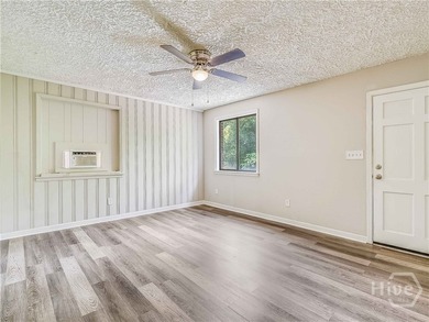 Solid and low-maintenance, this all-brick triplex sits in Garden - photo 6