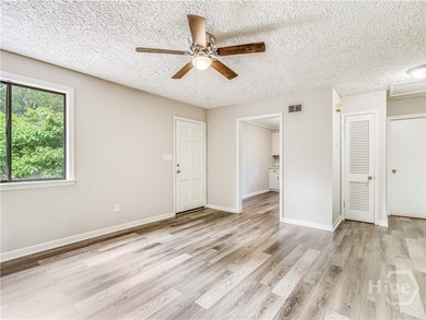 Solid and low-maintenance, this all-brick triplex sits in Garden - photo 7
