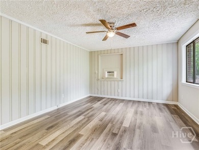 Solid and low-maintenance, this all-brick triplex sits in Garden - photo 9