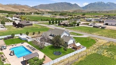 Experience elevated country living in the heart of Genola on - photo 1