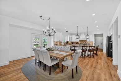 Experience elevated country living in the heart of Genola on - photo 4