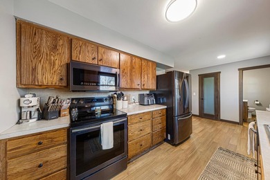 Rare find! Remodeled rambler sitting on a double lot! This home - photo 18